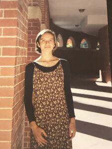 Jenn Reyes '99 was cast as a contestant on 'The Great American Baking Show,' now streaming on Roku. She's seen here in her senior portrait at Mary Washington, where her favorite class was orchestra and her efforts on violin won her a scholarship. Reyes' now plays violin with the New York Repertory Orchestra.