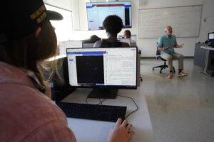 Plotting solar systems was part of the assignment in Distance and Scale in Astronomy. Photo by Suzanne Carr Rossi.