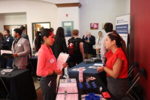 An accounting student speaks with a potential employer at a recent Business Career Pathways event hosted by UMW's College of Business.