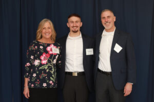 UMW junior Christopher Walker with his parents, Angela and Charles Walker, at the 2025 Student Showcase and Scholarship Luncheon. A cybersecurity major, Christopher earned the Society for Worldwide Financial Telecommunications Inc. (SWIFT) Scholarship and funding through a Virginia Talent + Opportunity Partnership grant, which has enabled him to serve as an intern at a local cybersecurity company while earning his degree and engaging in activities across campus. Photo by Karen Pearlman.