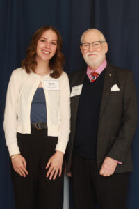 Bonnie Butler ’25, recipient of the Rebecca Culbertson Stuart Memorial Scholarship, poses with her donor, David Burgess. Bonnie, who served as a speaker at the luncheon, also received the Helen G. and Justin J. Piscopo Alvey Scholarship. Photo by Karen Pearlman.