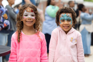Bouncy houses, slides, face painting, craft activities and sweets were available for the younger set.