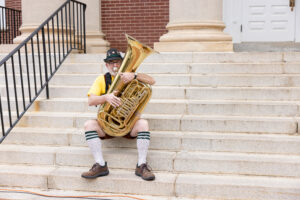 A member of the German musical group the LOW n’ BROWS prepares to perform.