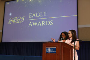 UMW seniors Martina Nicholson (left) and Kai Ortero exchanged lively banter as co-hosts of the Eagle Awards ceremony, honoring stellar accomplishments of UMW community members throughout the year. Photo by Karen Pearlman.