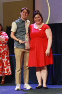 Center for Career and Professional Development Student Experience Manager Emily Burke (right) poses with UMW senior Knox McKinley after he was presented with the Life After Mary Washington Champion Award for students. Photo by Karen Pearlman.