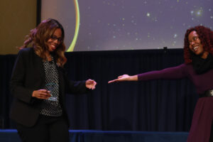 Rappahannock Scholars Program Counselor Shanita Mitchell (right) presents the Gwen Hale Giving Tree Award to Associate Provost for Community Relations and Compliance Shavonne Shorter. Photo by Karen Pearlman.