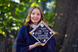 UMW graduate and historic preservation major Kayla Workman plans to pursue a master's degree in library information sciences at the University of Alabama and a future in archival work. She decorated her mortarboard for Saturday's Commencement ceremony with an inspirational quote from The Hobbit. Photo by Suzanne Carr Rossi.