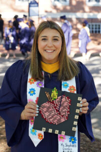 Elementary education major Amber Bearon has already secured a job teaching kindergarten at Hartwood Elementary School. The stole she is wearing was made with fingerprints of her former elementary school students. Photo by Suzanne Carr Rossi.