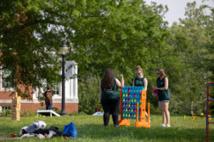 Fan-favorite lawn games like checkers, Scrabble and this giant Connect Four add to the competition and camaraderie of Devil-Goat Day. Photo by Parker Michels-Boyce.