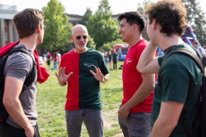 Mary Washington President Troy Paino, wearing a half-Goats/half-Devils T-shirt made by UMW Theatre's costume design shop, came out to mingle with students during Devil-Goat Day. Photo by Parker Michels-Boyce.