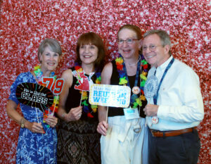 1979 alumni pose for pictures in the photo booth during the all-class party. Photo by Karen Pearlman.