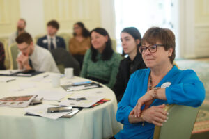 From right: Alumni Board Immediate Past President Vicky Sprague Ravenel ’77, Alumni Board member Katherine Redmiles ’15, Alumni Board President-Elect Charmayne Staloff ’05 and Alumni Board member Matthew Baker ’11 listen to presentations in April. Photo by Karen Pearlman.