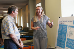 Senior Kaylie Curran presents her Graph Theory for AI project in the Hurley Convergence Center. Photo by Karen Pearlman.