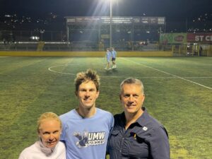 Thompson poses on the soccer field with his mother and father, Tracy and Chris Thompson. 'My dad taught me how to play soccer at the age of 3,' Thompson said, 'and has been my biggest supporter throughout my career.'