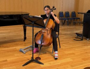 UMW student Meredith Walburn performs on the cello at the year-end music recital held in Seacobeck Hall Weatherly Wing. Photo by LIsa Marvashti.
