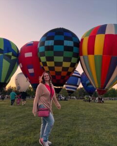 Taylor pictured at a hot air balloon festival and competition in Frankenmuth, a German-themed town in northern Michigan with a variety of German ambiance and architecture.