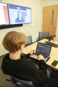 Sophomore Cory Wagaman-Eure works on his team's AHSSSI project inside the Hurley Convergence Center. The five-week summer institute is a research-intensive experience for students who work under the guidance of faculty members. Photo by Karen Pearlman.
