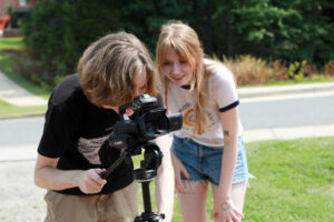 UMW students Owen Wheeler and Chloe Adler practice filmmaking during this year's AHSSSI summer research experience. Photo by Karen Pearlman.