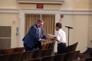 UMW Provost Timothy O'Donnell presents Associate Professor of Computer Science Xin-Wen Wu with the Alumni Association Outstanding Young Faculty Member Award. Photo by Sam Cahill.