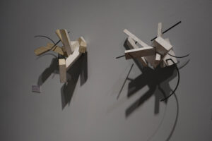 Both artists, David Carlson and Chee Keong Kung, explore concepts of space and time through graceful, undulating forms in the 'Intersection' exhibit. Photo by Nellie Bittenbender.