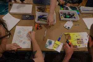 Artist Erika Stearly's participatory project, 'Take a Painting,' emphasizes both the process and the product, blurring the line between audience, participant, artist, and individual, and offers multiple ways to engage with the work. Photo by Nellie Bittenbender.