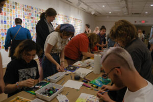 'Take a Painting' at duPont Gallery is an evolving, participatory installation by Erika Stearly that transforms the gallery into a working studio. Photo by Nellie Bittenbender.