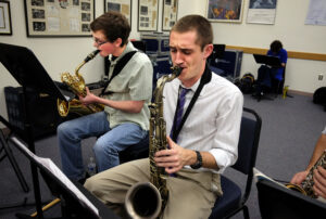 Members of the University of Mary Washington Jazz Ensemble rehearse. The group performs contemporary jazz arrangements and big band favorites. Photo by Norm Shafer.