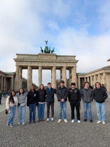 A UMW business study-abroad group pose at Brandenburg Gate in Berlin, Germany on a study-abroad trip in May 2024.