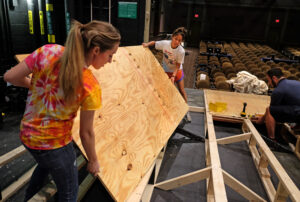 Students work to construct props for an upcoming dramatic performance. UMW Theatre students learn about set construction, costume making and more, and they go on to careers on Broadway and beyond.