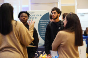 Area employers set up tables at UMW's biannual Career and Internship Fair in search of college-degree-seeking students to fill their openings. Photo by Suzanne Carr Rossi.