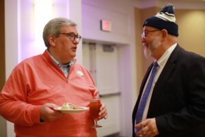 Director of Transfer Advising Charles Tate (left) speaks with Executive Director of UMW Museums Scott Harris. Photo by Karen Pearlman.