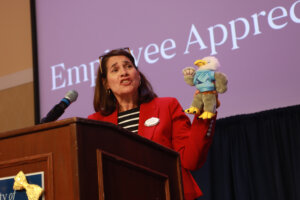 Director of Community Events Ali Hieber addresses the crowd at the Employee Appreciation Luncheon. Photo by Karen Pearlman.
