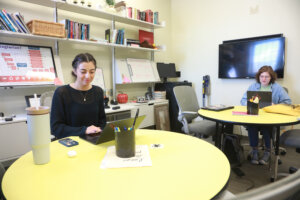 Student consultants, like sophomore historic preservation and environmental science double major Clarisa Johnson (L) and junior geography major Sarala Kennedy (R), assist their Mary Washington peers in the Speaking and Writing Center, a resource for students honing their communication skills. Photo by Karen Pearlman.