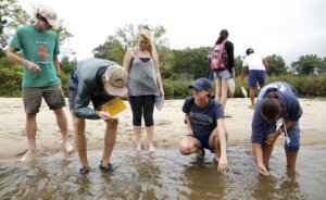 Professor of Earth and Environmental Science Pamela Grothe (wearing blue baseball cap) explores with students during an off-campus excursion. UMW's new Irene Piscopo Rodgers School of Science incorporates earth and environmental science with the chemistry and physics department and the biological sciences.