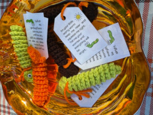 'Worry Worms' crocheted by UMW alumna Analisa Ayala '24, who donated the trinkets to the Talley Center. "Students like to put them on their backpacks to remind others about the Talley Center resources," said Debbie Huff, the center's office manager.
