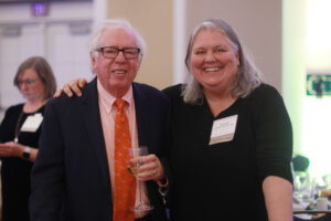 Distinguished Professor Emeritus of History William Crawley and a guest, Trenda Powell Jacocks '82.