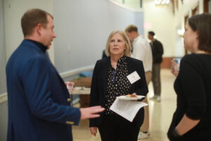 The man who helped establish the Case Competition at UMW talks with the dean of the College of Business
