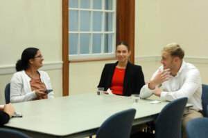 UMW students converse before presenting at the Case Competition