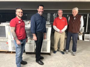 From left: UMW Director of Maintenance Services Alan Hunter, Assistant Vice President for Facilities and Capital Outlay Brian Gorham, Fredericksburg Regional Food Bank President and CEO Dan Maher, and Fredericksburg resident and author Jim Hall, who convened the project. 