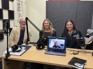 Photo of President Paino with students featured in episode three of the podcast