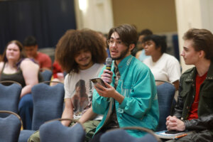Audience members at a Braver Angels debate held at the University of Mary Washington asked questions through a moderator as part of the event's unique format. Photo by K Pearlman Photography
