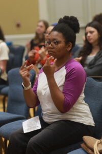 Audience members at last week's Braver Angels debate at the University of Mary Washington were asked to show support for speakers by snapping their fingers, patting their laps or tapping their toes. Photo by K Pearlman Photography.