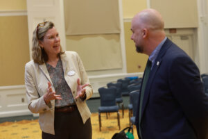 UMW Center for Community Engagement Director Sarah Dewees, who served as the main organizer for last week's Braver Angels debate, speaks with Germanna Community College Dean of Humanities and Social Sciences Eric Earnhardt. Students from Germanna and UMW participated in last week's Braver Angels debate at Mary Washington. Photo by K Pearlman Photography.