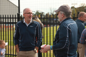 Photo of Lou Marmo at Homecoming with UMW Chief of Staff and Vice President of Strategy Jeff McClurken.