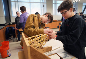 Cameron Mason, 13 (left), and Alexander Hamilton, 13, both eighth-graders from Riverbend Middle School in Sterling, Virginia, compete in the Virginia Science Olympiad at UMW on Saturday. Photo by Suzanne Carr Rossi.