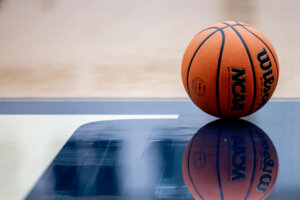 Photo of a basketball on the court