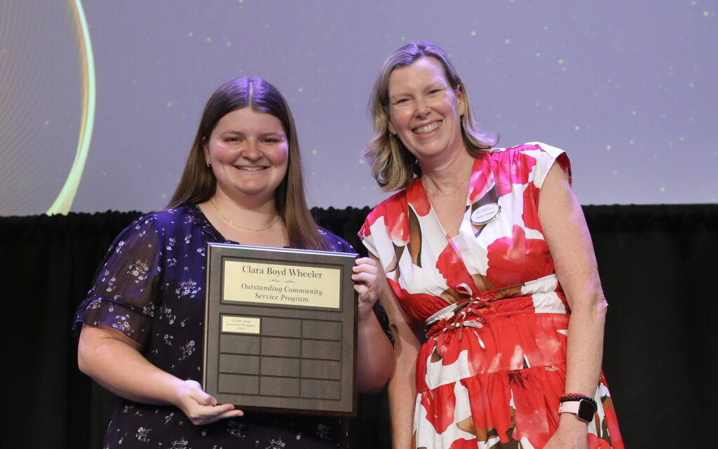 someone accepting an award onstage