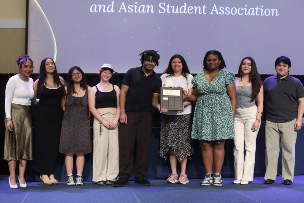 people accepting an award onstage