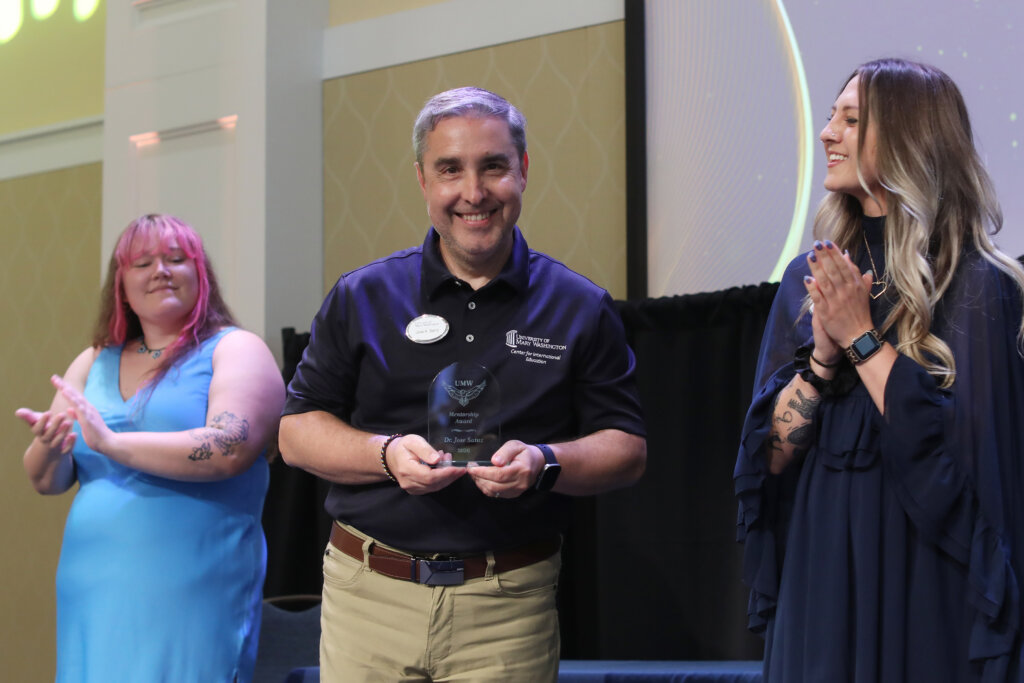 someone accepts an award onstage