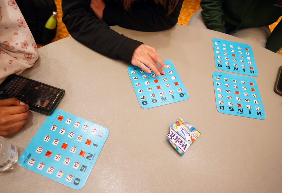 A table with blue Bingo cards on it